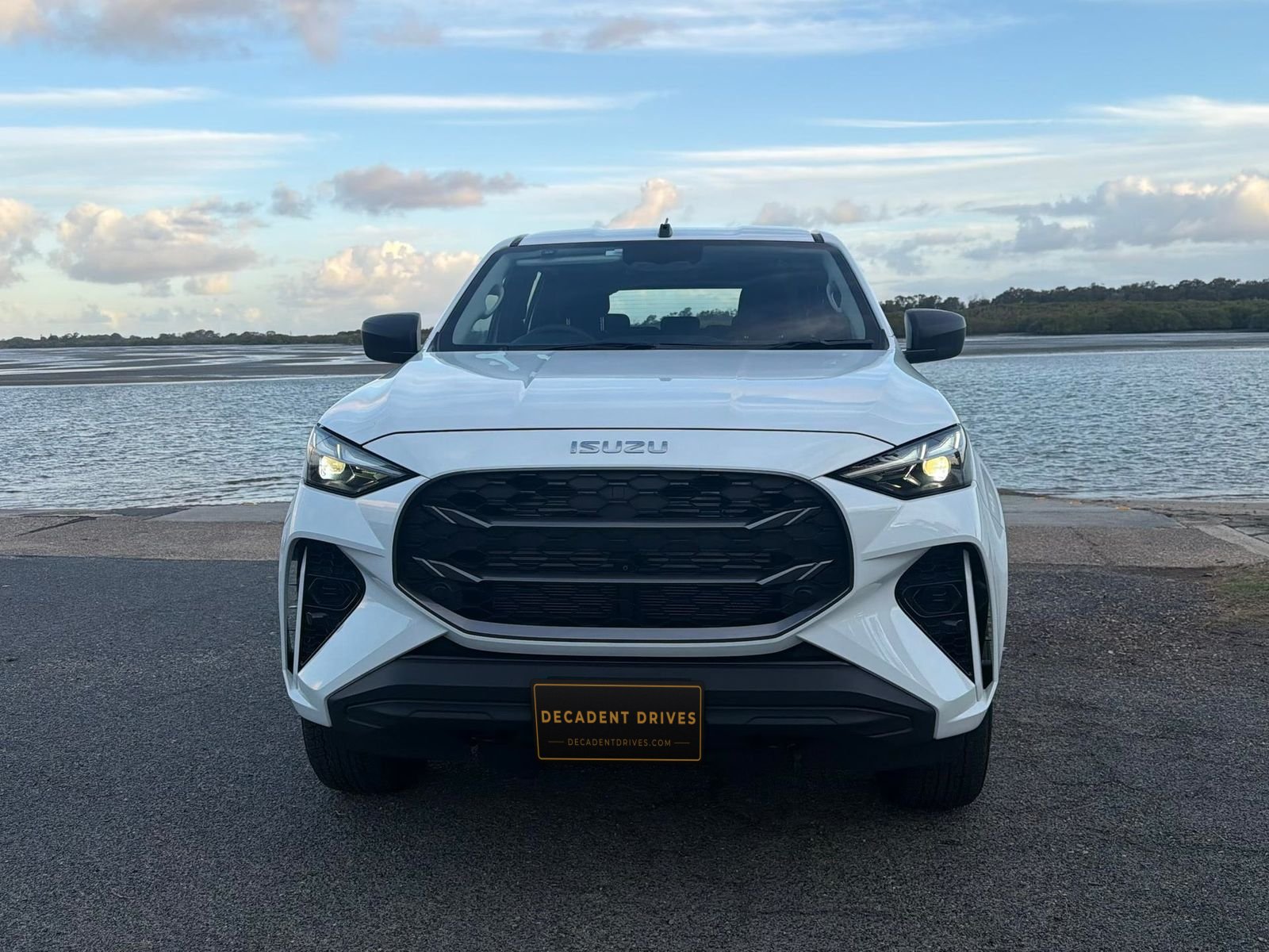 White 2025 Isuzu MU-X 7-seat SUV, front view